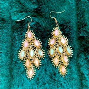 Never worn, pair of gold earrings